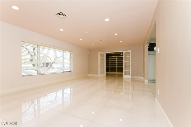 empty room featuring light tile patterned flooring