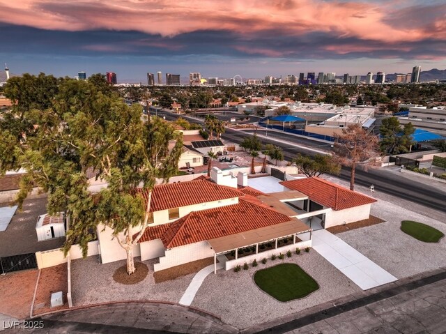 birds eye view of property with a city view