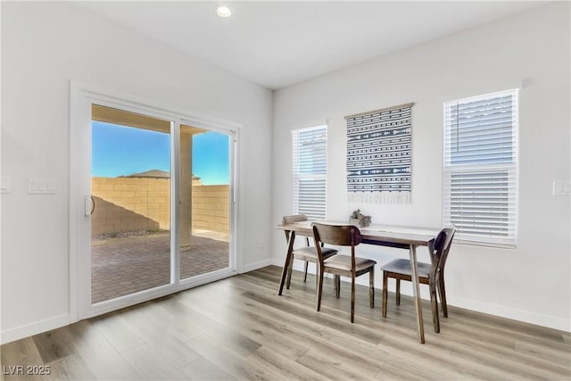 dining room with light hardwood / wood-style floors