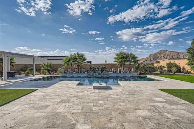 view of swimming pool featuring a pergola, a patio, and a mountain view