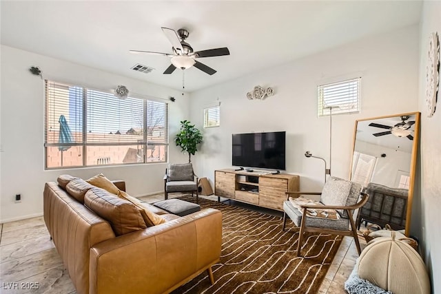 living room featuring ceiling fan