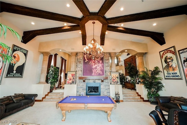 game room featuring decorative columns, light colored carpet, a fireplace, and lofted ceiling with beams