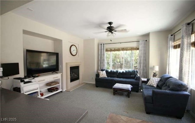 living room with ceiling fan and light carpet