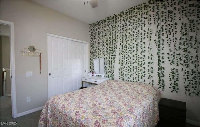 carpeted bedroom featuring a closet