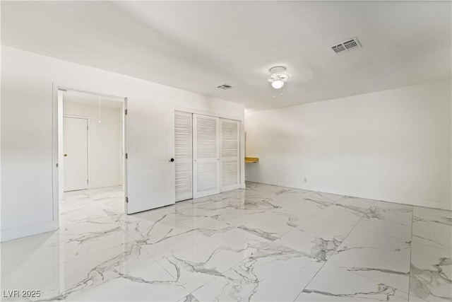 unfurnished bedroom featuring a closet