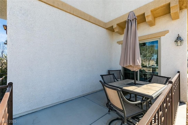 view of patio / terrace featuring a balcony