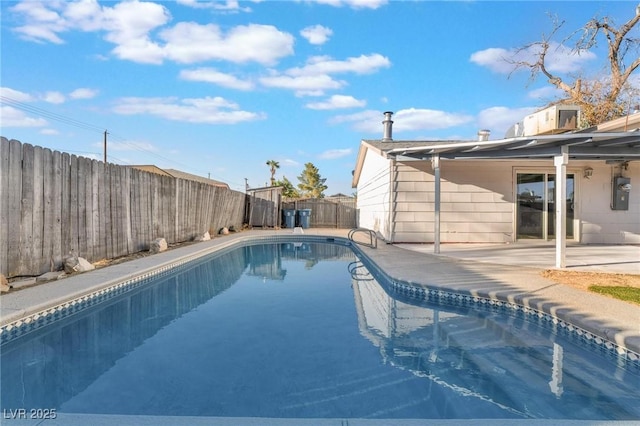 view of pool featuring a patio