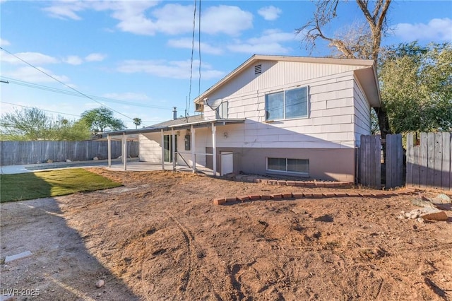 back of property featuring a patio area