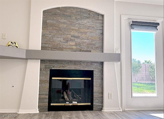 interior details with hardwood / wood-style flooring