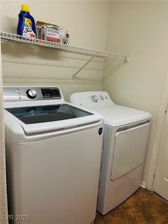 laundry room with washer and clothes dryer