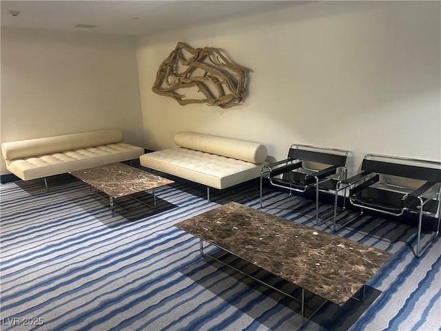 living area with carpet flooring