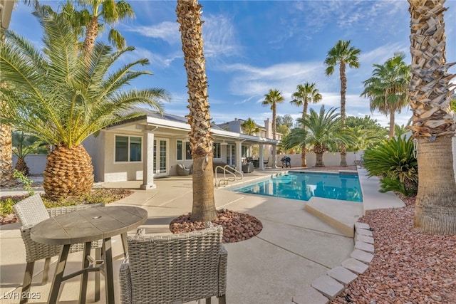 view of pool featuring a patio area