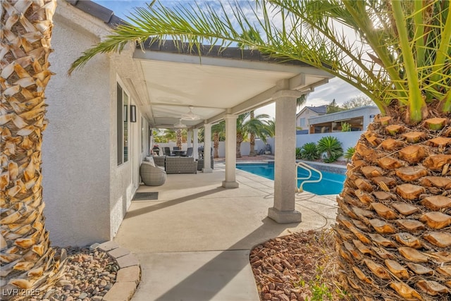 view of pool featuring a patio and outdoor lounge area