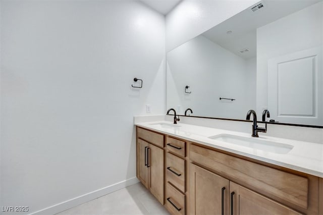 bathroom featuring vanity and tile patterned flooring