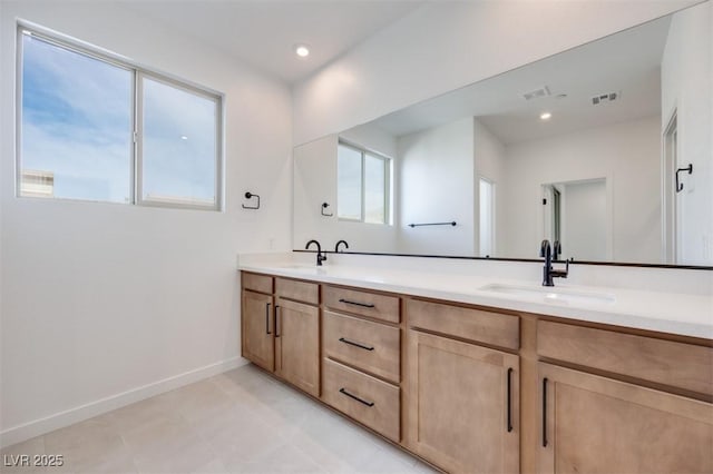 bathroom featuring vanity