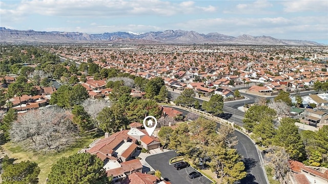 drone / aerial view featuring a mountain view and a residential view