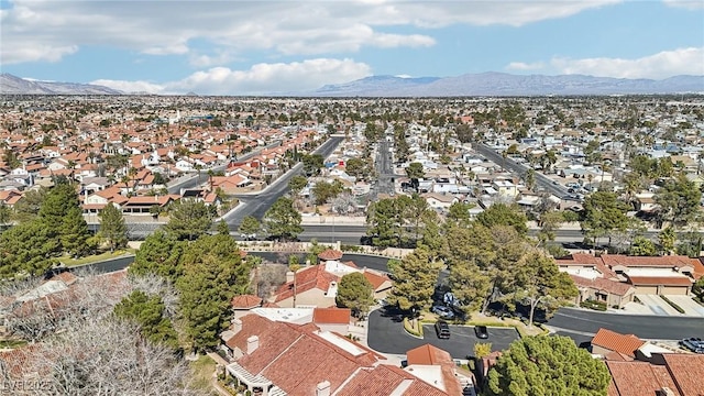 birds eye view of property with a residential view and a mountain view