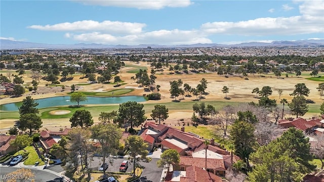 bird's eye view with golf course view and a water and mountain view