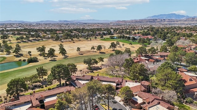 birds eye view of property featuring a residential view, view of golf course, and a water and mountain view