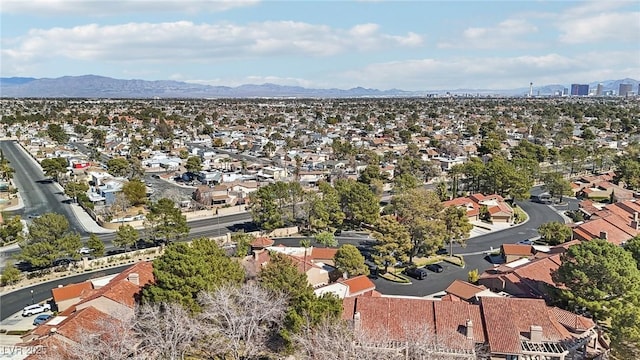 drone / aerial view featuring a mountain view and a residential view