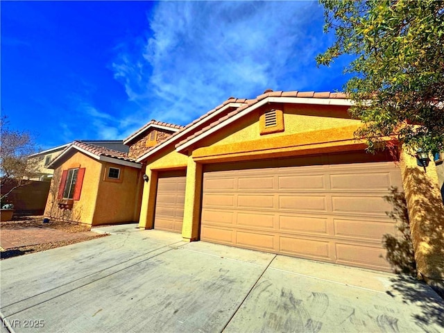 view of front of home with a garage