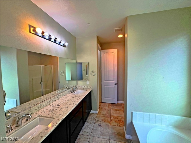 bathroom featuring plus walk in shower and vanity