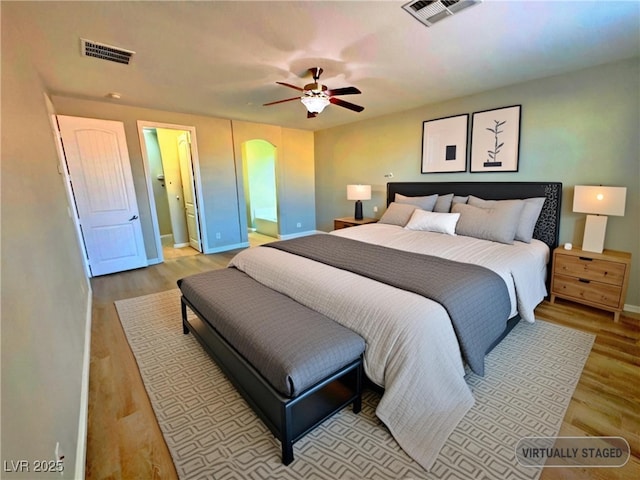 bedroom with light wood-type flooring and ceiling fan