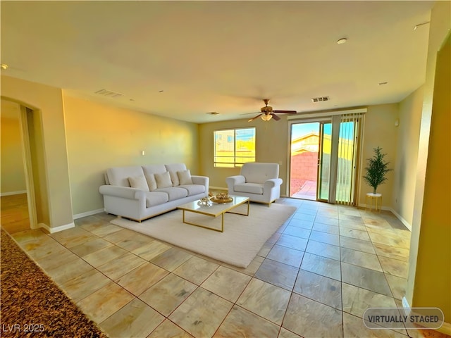 living room with ceiling fan