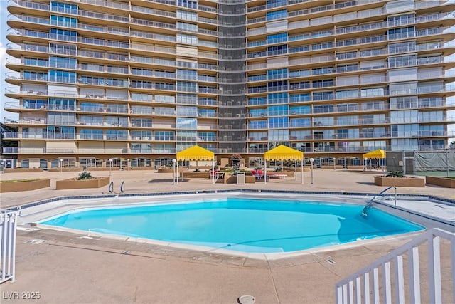 3111 Bel Air Dr Unit 20D, Las Vegas, NV 89109 - community pool with a patio