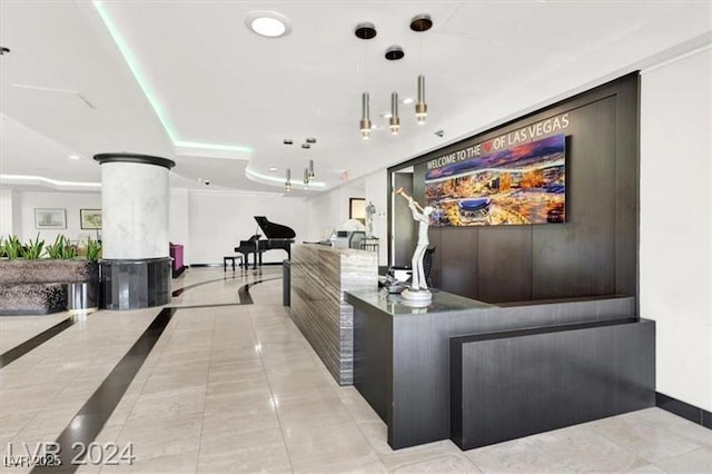 reception area featuring decorative columns