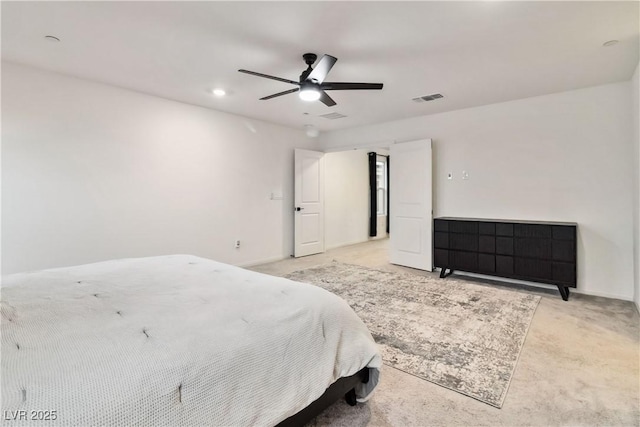 bedroom with light carpet and ceiling fan