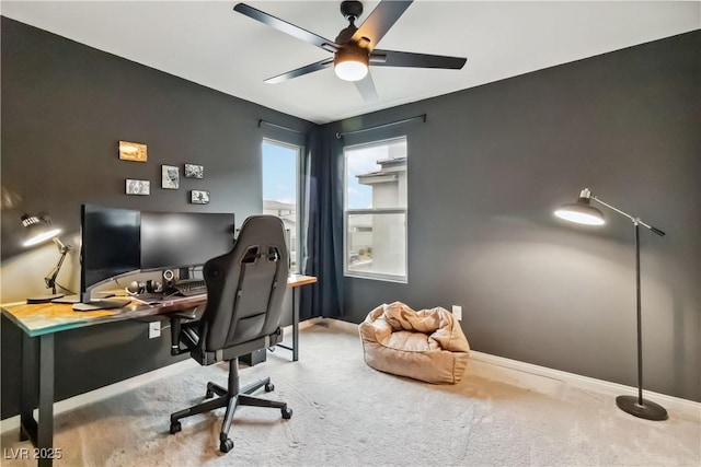 office featuring carpet and ceiling fan