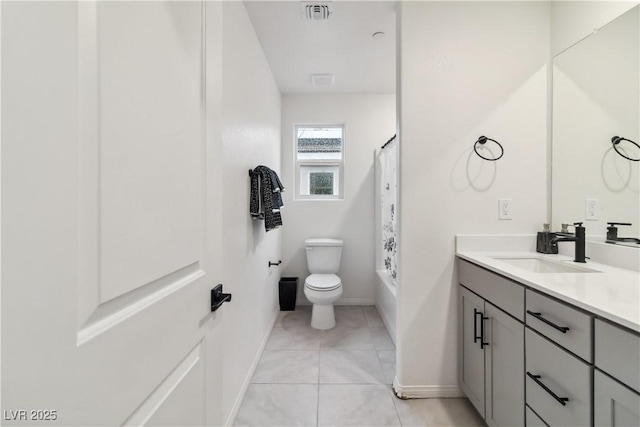 full bathroom with tile patterned flooring, vanity, toilet, and shower / bath combo with shower curtain