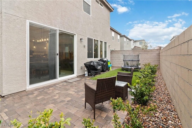 view of patio / terrace with a trampoline