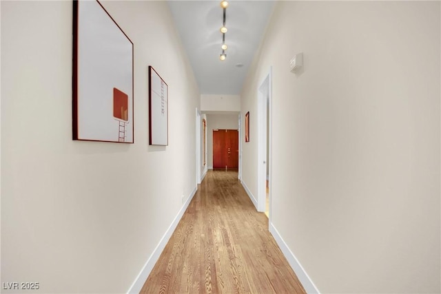 hallway featuring light hardwood / wood-style floors