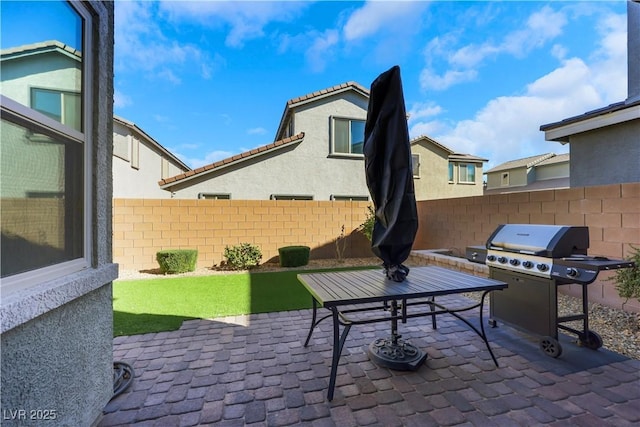 view of patio with area for grilling