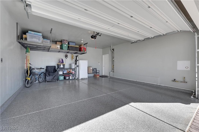 garage with white refrigerator