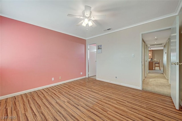 unfurnished room featuring light wood-type flooring, ornamental molding, and ceiling fan