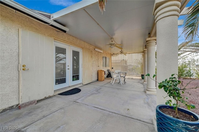 view of patio / terrace with french doors and ceiling fan