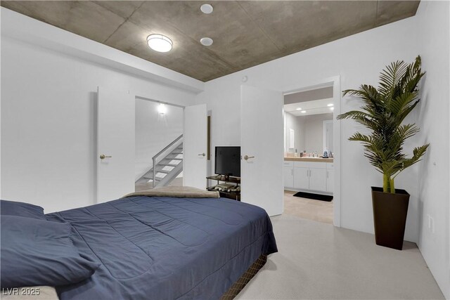 360 E Desert Inn Rd Unit 604, Las Vegas, NV 89109 - bedroom with ensuite bath and a sink