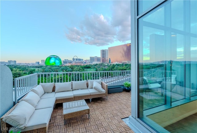 360 E Desert Inn Rd Unit 604, Las Vegas, NV 89109 - balcony with outdoor lounge area and a view of city