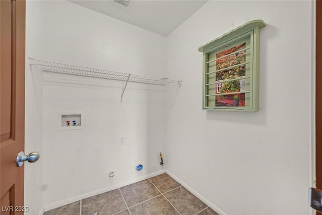 washroom featuring hookup for a washing machine, gas dryer hookup, and tile patterned flooring