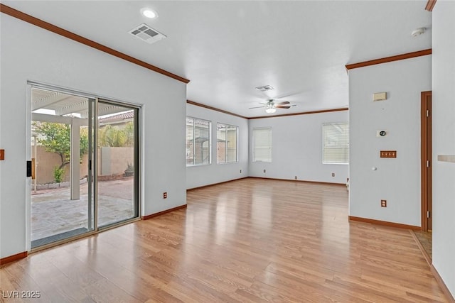 unfurnished living room with ornamental molding, ceiling fan, and light wood-type flooring