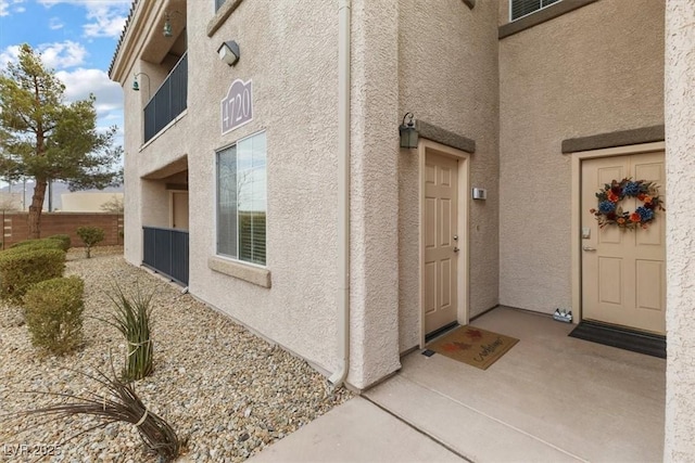 entrance to property with a patio