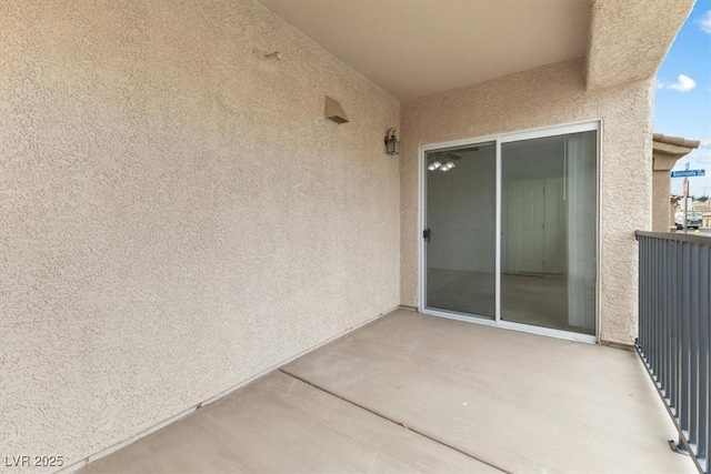 view of patio / terrace with a balcony