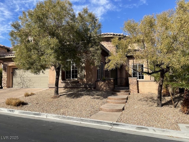 obstructed view of property with a garage