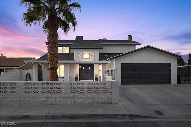 view of front of home with a garage