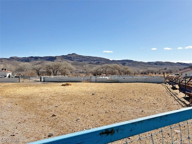 property view of mountains featuring a rural view