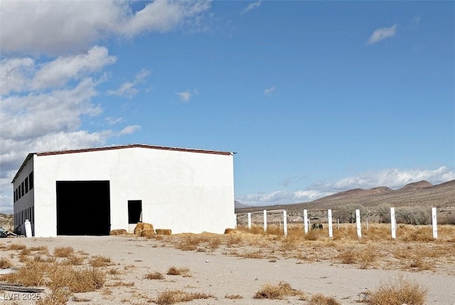 view of outdoor structure featuring a mountain view