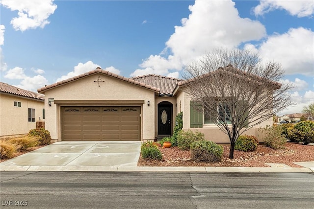 mediterranean / spanish-style home featuring a garage